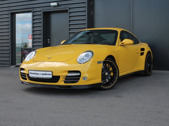 2009 Porsche 911 Turbo VI (997) Рестайлинг, жёлтый