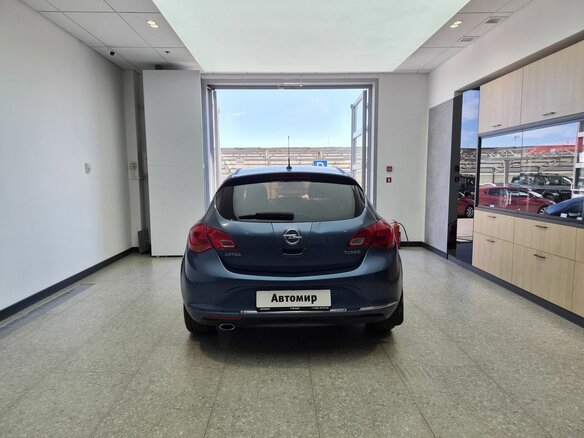 2012 Opel Astra J Рестайлинг, синий - вид 4