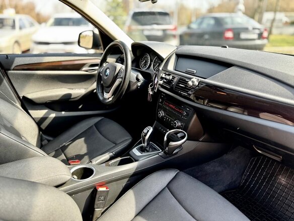 2012 BMW X1 20i I (E84) Рестайлинг, коричневый, 1350000 рублей - вид 9