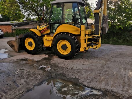 2005 New Holland B115B, жёлтый, 4500000 рублей, вид 3