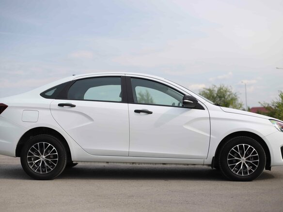 2024 Lada (ВАЗ) Vesta I Рестайлинг (NG), белый, 1120230 рублей - вид 3