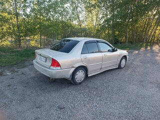 2003 Ford Laser IV, серебристый, 230000 рублей, вид 1