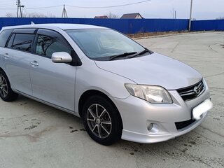 2010 Toyota Corolla Fielder X (E140, E150) Рестайлинг, серебристый, 950000 рублей, вид 2