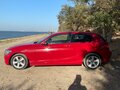2012 BMW 1 серии 116i II (F20/F21), красный, 1340000 рублей - вид 2