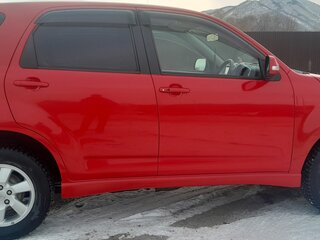 2006 Toyota Rush I, красный, 1050000 рублей, вид 1