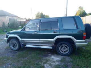 1997 Isuzu Bighorn II, зелёный, 550000 рублей, вид 3