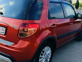2011 Suzuki SX4 I (Classic) Рестайлинг, красный, 850000 рублей, вид 4