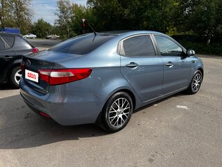 2011 Kia Rio 4-speed III, голубой, 960000 рублей, вид 5