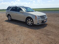 2008 Cadillac SRX 6-speed I, золотистый - вид 1