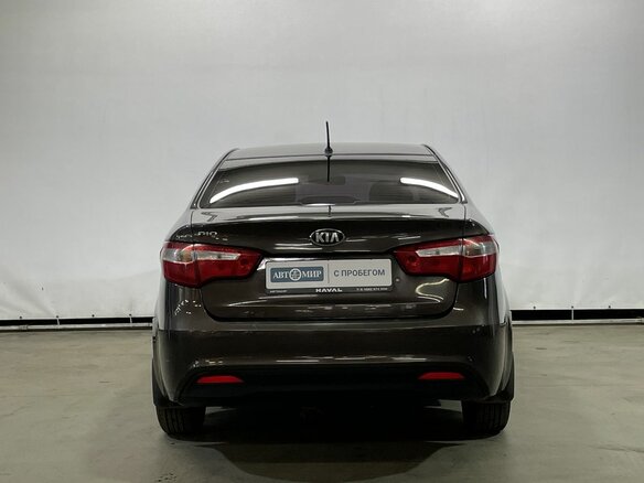 2014 Kia Rio III, коричневый - вид 5