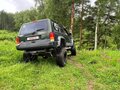 1997 Jeep Cherokee II (XJ) Рестайлинг, зелёный - вид 9