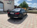 2011 BMW 7 серии 750i xDrive V (F01/F02/F04), чёрный, 2500000 рублей - вид 5