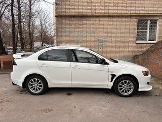 2010 Mitsubishi Lancer X, белый, 930000 рублей, вид 2