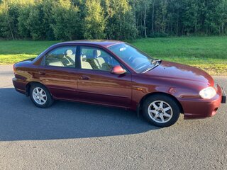 2011 Kia Spectra I Рестайлинг 2, красный, 610000 рублей, вид 2