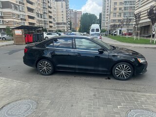 2016 Volkswagen Jetta VI Рестайлинг, чёрный, 1700000 рублей, вид 3