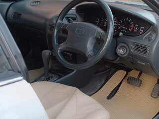 1996 Toyota Corolla VII (E100), серебристый, 350000 рублей, вид 4