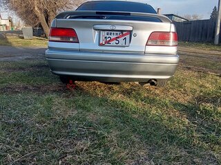 1997 Toyota Carina VII (T210), серебристый, 650000 рублей, вид 3