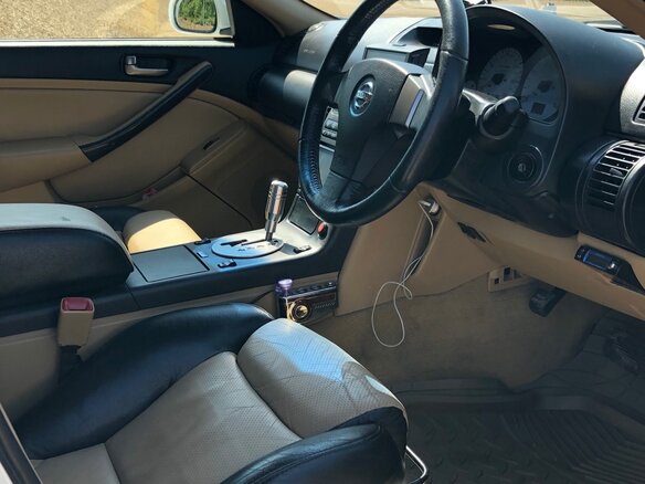 2003 Nissan Stagea II, белый - вид 9