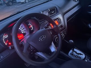 2012 Kia Rio 4-speed III, серебристый, 1100000 рублей, вид 4
