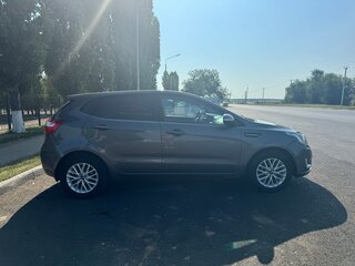 2014 Kia Rio 6-speed III, серый, 1100000 рублей, вид 3