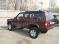 2001 Jeep Cherokee II (XJ) Рестайлинг, красный - вид 4
