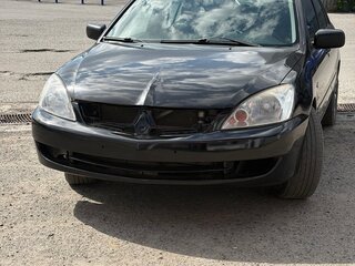 2005 Mitsubishi Lancer IX Рестайлинг, чёрный, 450000 рублей, вид 1