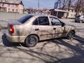 2004 Hyundai Accent ТагАЗ II, коричневый, 400000 рублей - вид 3