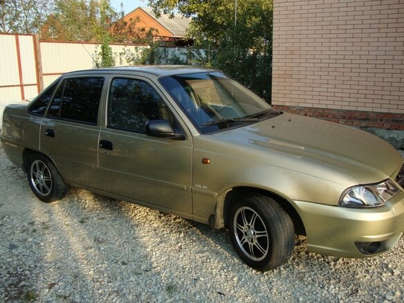 2011 Daewoo Nexia I Рестайлинг, бежевый - вид 3