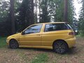 1999 Alfa Romeo 145 I Рестайлинг, жёлтый - вид 1