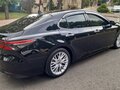 2018 Toyota Camry VIII (XV70), чёрный, 3200000 рублей - вид 2