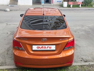 2015 Hyundai Solaris I Рестайлинг, оранжевый, 880000 рублей, вид 2