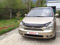 2009 Kia Carnival Grand II, золотистый, 1200000 рублей