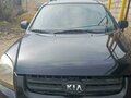 2006 Kia Sportage II, чёрный, 850000 рублей