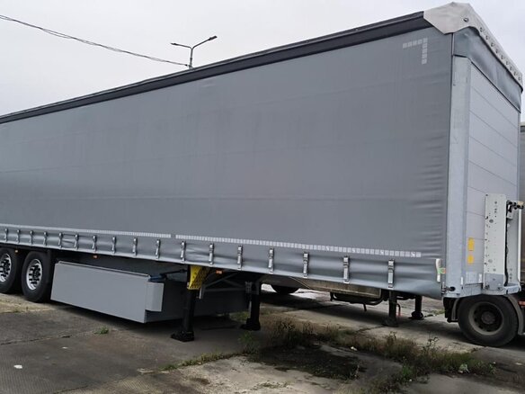 2024 Schmitz Cargobull 9084, серебристый - вид 4