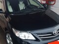 2011 Toyota Corolla X (E140, E150) Рестайлинг, чёрный, 870000 рублей - вид 2