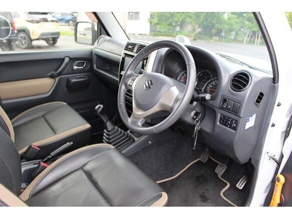 2015 Suzuki Jimny Kei car III Рестайлинг 2, белый - вид 11