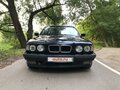 1994 BMW 5 серии 525i III (E34), синий - вид 1