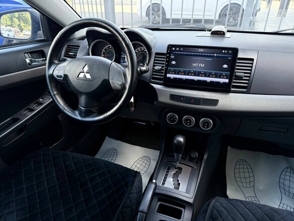 2011 Mitsubishi Lancer X Рестайлинг, зелёный, 644000 рублей - вид 15