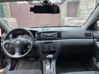 2002 Toyota Corolla IX (E120, E130), чёрный, 700000 рублей, вид 5