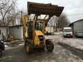 2008 Komatsu WB93R-5, жёлтый - вид 2