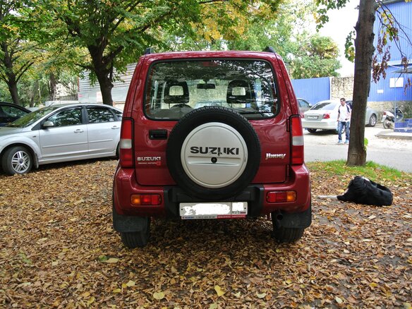 2011 Suzuki Jimny III Рестайлинг 1, красный - вид 8