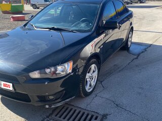 2008 Mitsubishi Lancer X, чёрный, 600000 рублей, вид 1