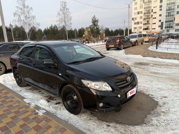 2008 Toyota Corolla X (E140, E150), чёрный, 800000 рублей - вид 2