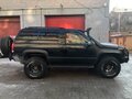 1997 Chevrolet Tahoe I, чёрный - вид 1