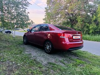 2010 Kia Cerato 5-speed II, красный, 750000 рублей, вид 5