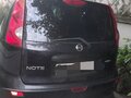 2008 Nissan Note I, чёрный, 720000 рублей - вид 1