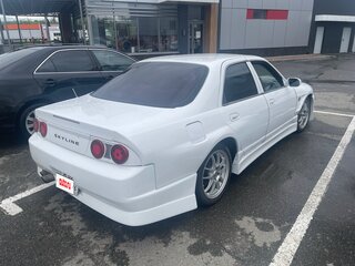 1996 Nissan Skyline IX (R33), белый, 850000 рублей, вид 4