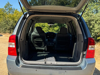 2009 Kia Carnival II, серый, 1050000 рублей, вид 4