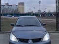 2006 Mitsubishi Lancer IX, серебристый, 245000 рублей - вид 1