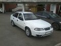2010 Daewoo Nexia I Рестайлинг, белый - вид 4